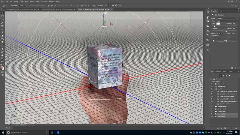 Image showing the Gamut Inks print box composited with my hand within Adobe Photoshop's 3D editing environment.